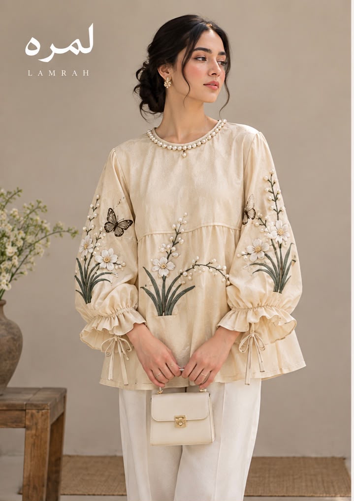 WOMENS IVORY RUFFLE CUFF TOP